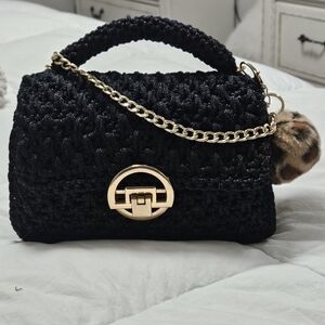 Stylish Black Mini Bag with Gold Accents